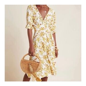Faithful the Brand deep V-neck floral midi dress